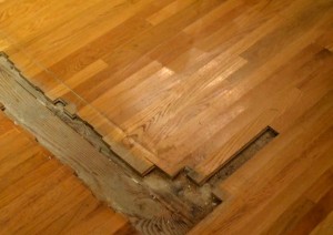What happens when you rempve a wall, the timber flooring will need restoration. That's what. Call Profloor Australia